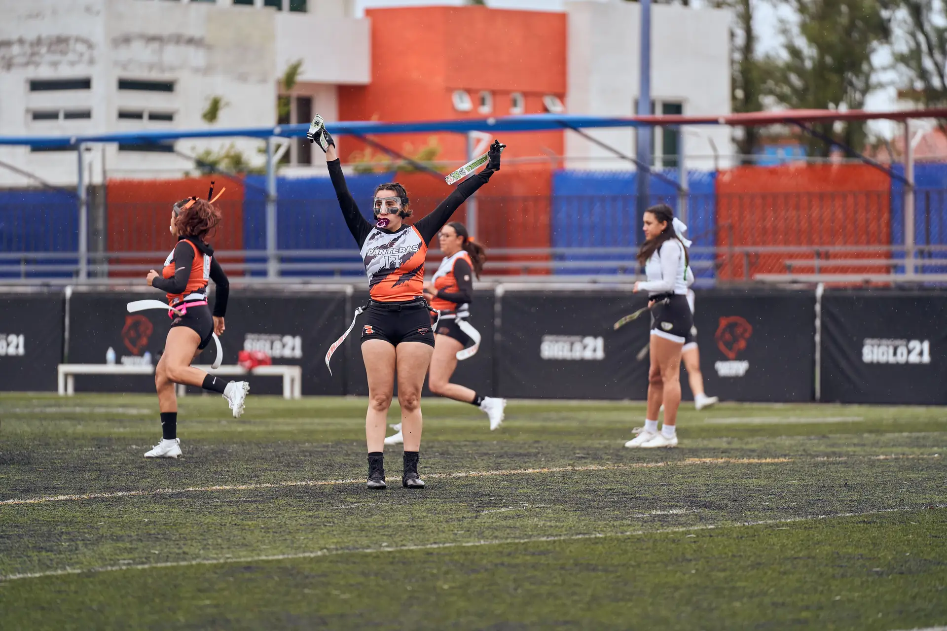 Girls flag football player celebrating a play on the field